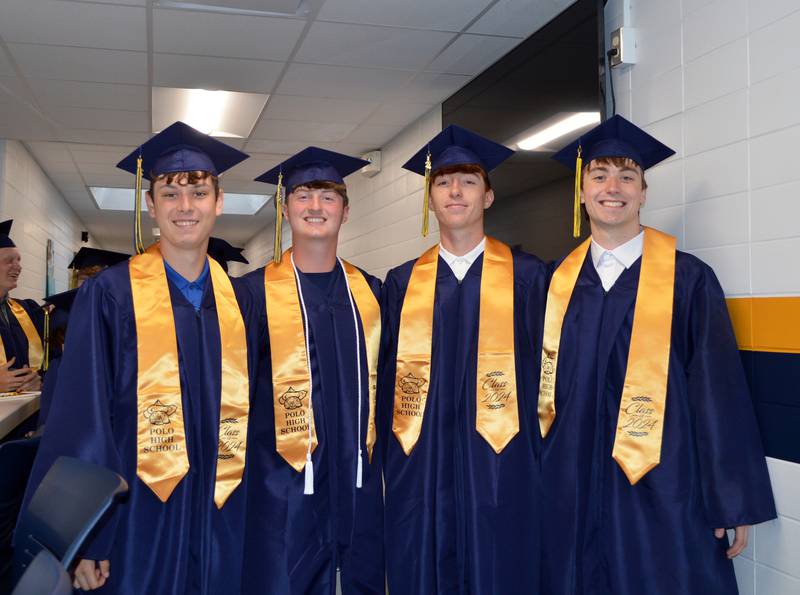 Polo Community High School seniors Carter Merdian, Landen Brooks, Nolan Hahn and Brock Soltow pose for a photo before graduation Sunday, May 19, 2024.