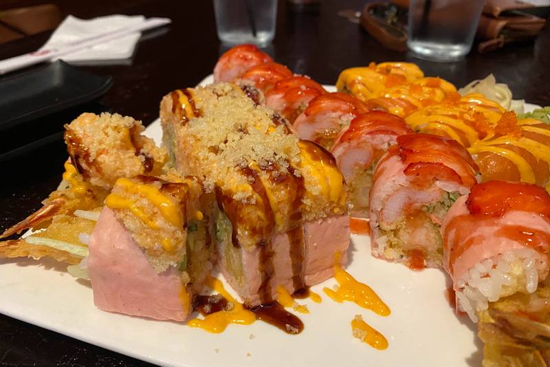 While at Kumi Sushi, we ordered, from left to right, the pink lady, strawberry fin, and crazy salmon rolls.