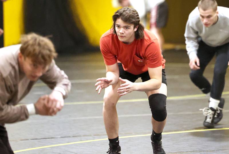 Sycamore wrestler Gabriel Crome warms up before practice Tuesday, Jan. 31, 2023, at Sycamore High School.