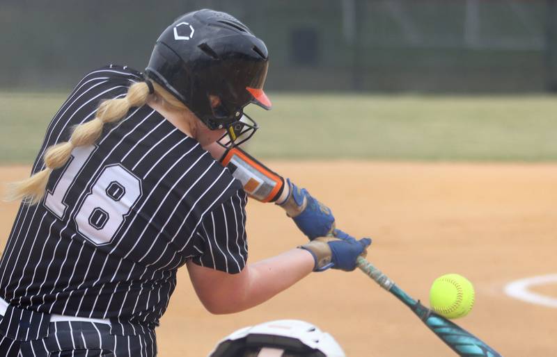 Crystal Lake Central’s Logan Grams connects for a hit against Woodstock North in IHSA Class 3A Regional Title Game softball action on Saturday, May 23, 2026 at Crystal Lake Central High School in Crystal Lake.