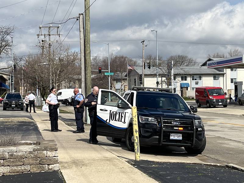 Joliet police officers at the scene of a shooting on Thursday, March 14 on Republic Avenue in Joliet.