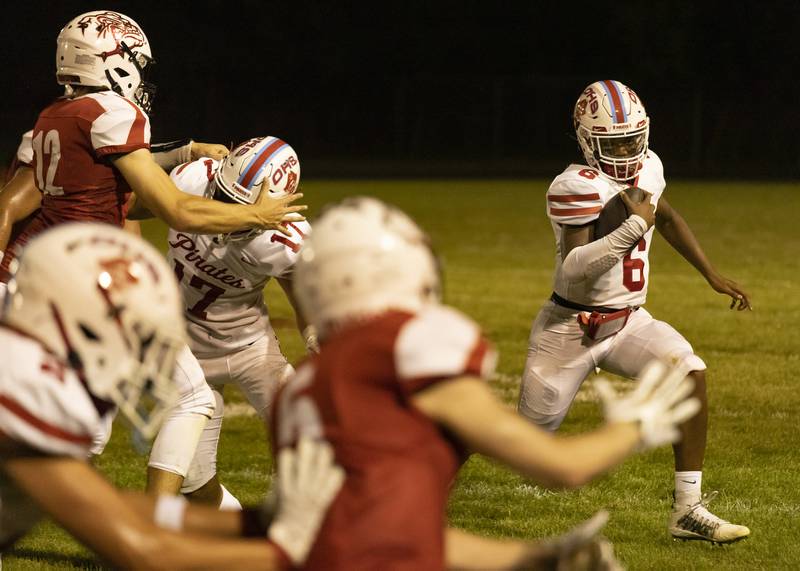 Ottawa's Colby Mortensen (6) runs down the field against Streator on Friday, Sept. 2, 2022 in Streator.