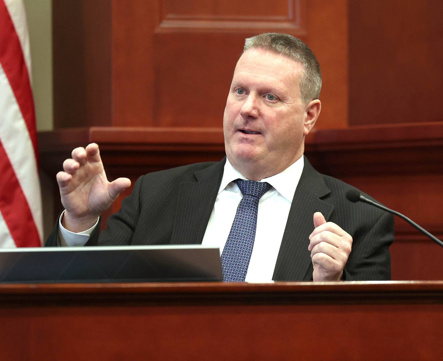 Retired DeKalb County sheriff’s Detective John Holiday testifies Monday, Jan. 27, 2025, on Day 3 of the Jonathan D. Hurst trial at the DeKalb County Courthouse in Sycamore. Hurst is charged in the 2016 killings of elderly mother and son Patricia and Robert Wilson.