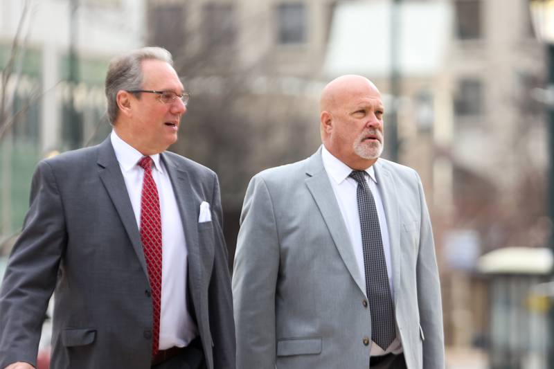 Don “Duck” Dickinson, right, arrives to the Will County Courthouse with his lawyer Frank Andreano. The former Joliet councilman is charge with false accusation against the Joliet Mayor. Monday, April 11, 2022, in Joliet.