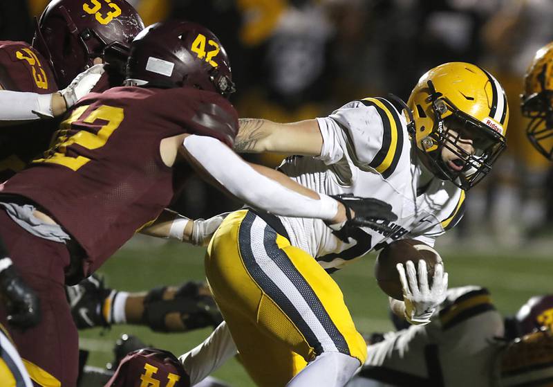 Richmond-Burton's Blake Livdahl tackles St. Laurence's Harley Rizzs during an IHSA Class 4A first-round football game on Friday, Nov. 1, 2024, at Richmond-Burton High School in Richmond.