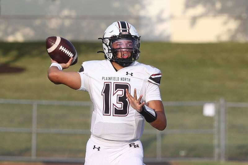 Plainfield North’s Cole Svara passes against Lockport on Friday, August 30, 2024 in Lockport.