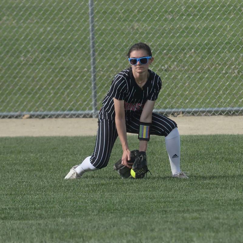 Forreston's Ayla Kiper fields a hit to the outfield during a Monday, May 12, 2025 game with Lena-Winslow at Forreston High School.