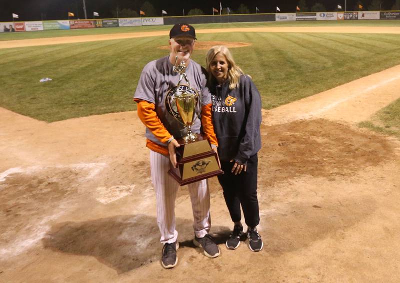 Illinois Valley Pistol Shrimp team owner and field manager John Jakiemiec and general manager June Keeley pose for a photo with the Prospect Trophy  on Wednesday, Aug. 7, 2024 at Schweickert Stadium in Peru.