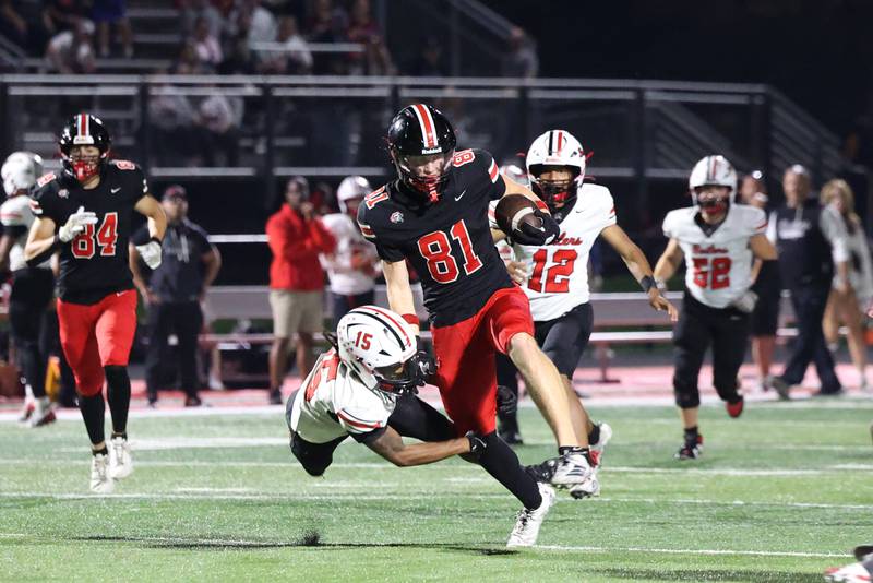 Lincoln-Way Central's Lucas Andresen evades a tackle by Bradley-Bourbonnais' Jordan Fitch during the Knight's 28-20 victory over Bradley-Bourbonnais on Friday, Oct. 3, 2025.