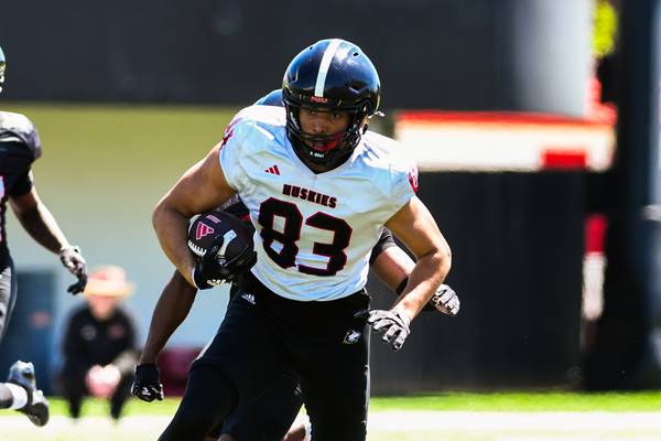 Suit and tie, ready to play: NIU tight end, Niles West grad Jason Fowler, doing more than dressing the part 