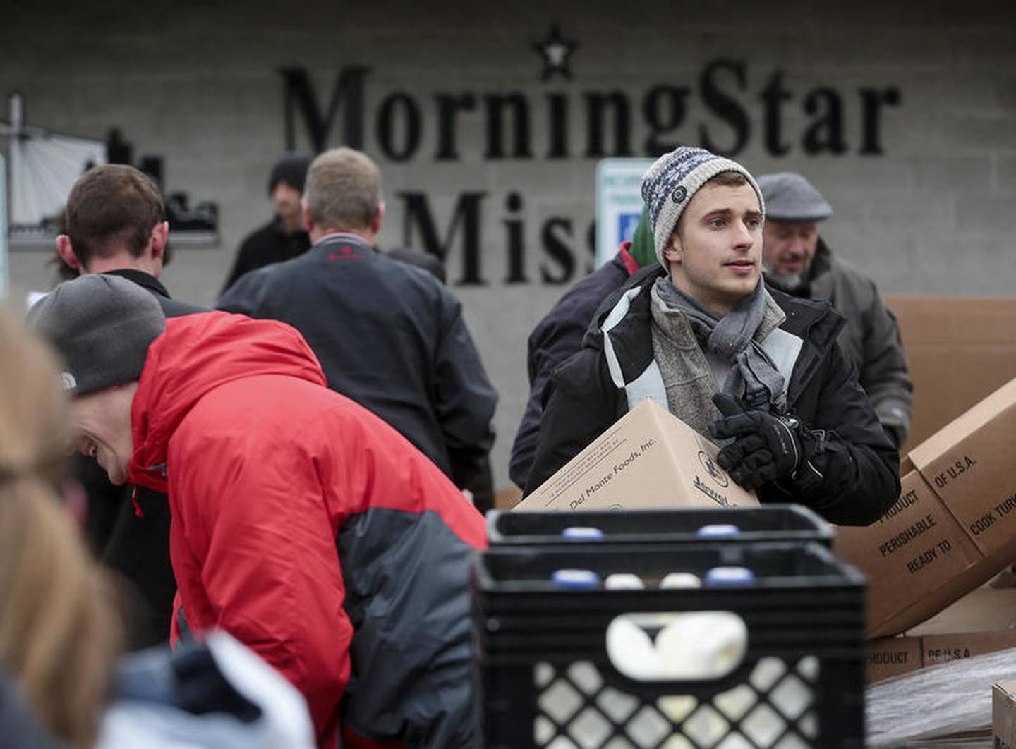 Volunteers from across Will County fulfill Thanksgiving meals Tuesday, Nov. 22, 2016 at Morning Star Mission in Joliet, Ill.