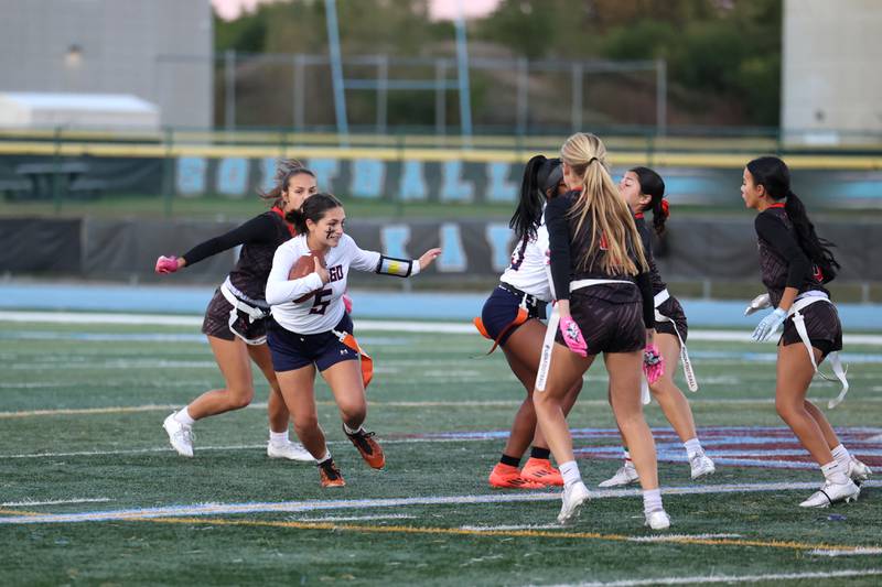 Oswego's Violette Wisniowicz runs the ball against Yorkville during the Foxes' 2-1 overtime victory over Oswego in the IHSA Kankakee Regional championship game on Thursday, Oct. 9, 2025.