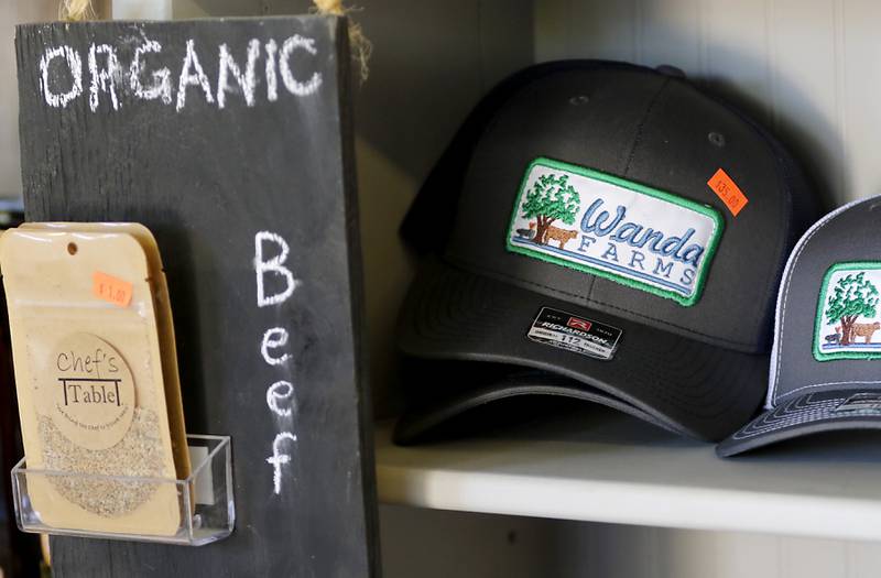Hats and organic beef for sale during a stop on the McHenry County Farm Stroll on Sunday, Sept. 29, 2024, at Hephzibah Farms in Hebron. The farm stroll, a self-guided tour of McHenry County’s family farms, featured farm tours, demonstrations and products for sale at eleven farms.