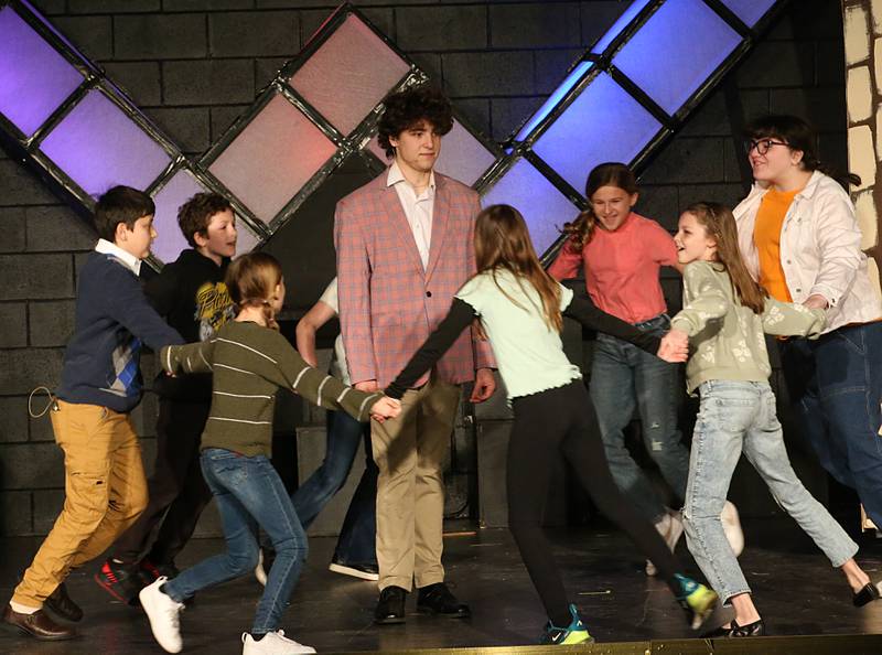 The cast of Willy Wonka acts out a scene during a performance on Thursday, March 16, 2023 at Putnam County High School.