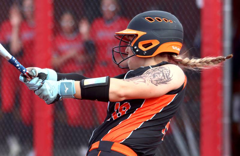 DeKalb’s Kennedy Latimer connects against Huntley in IHSA Class 4A Sectional Semifinal softball action at Barrington High School in Barrington on Wednesday, June 4, 2025.