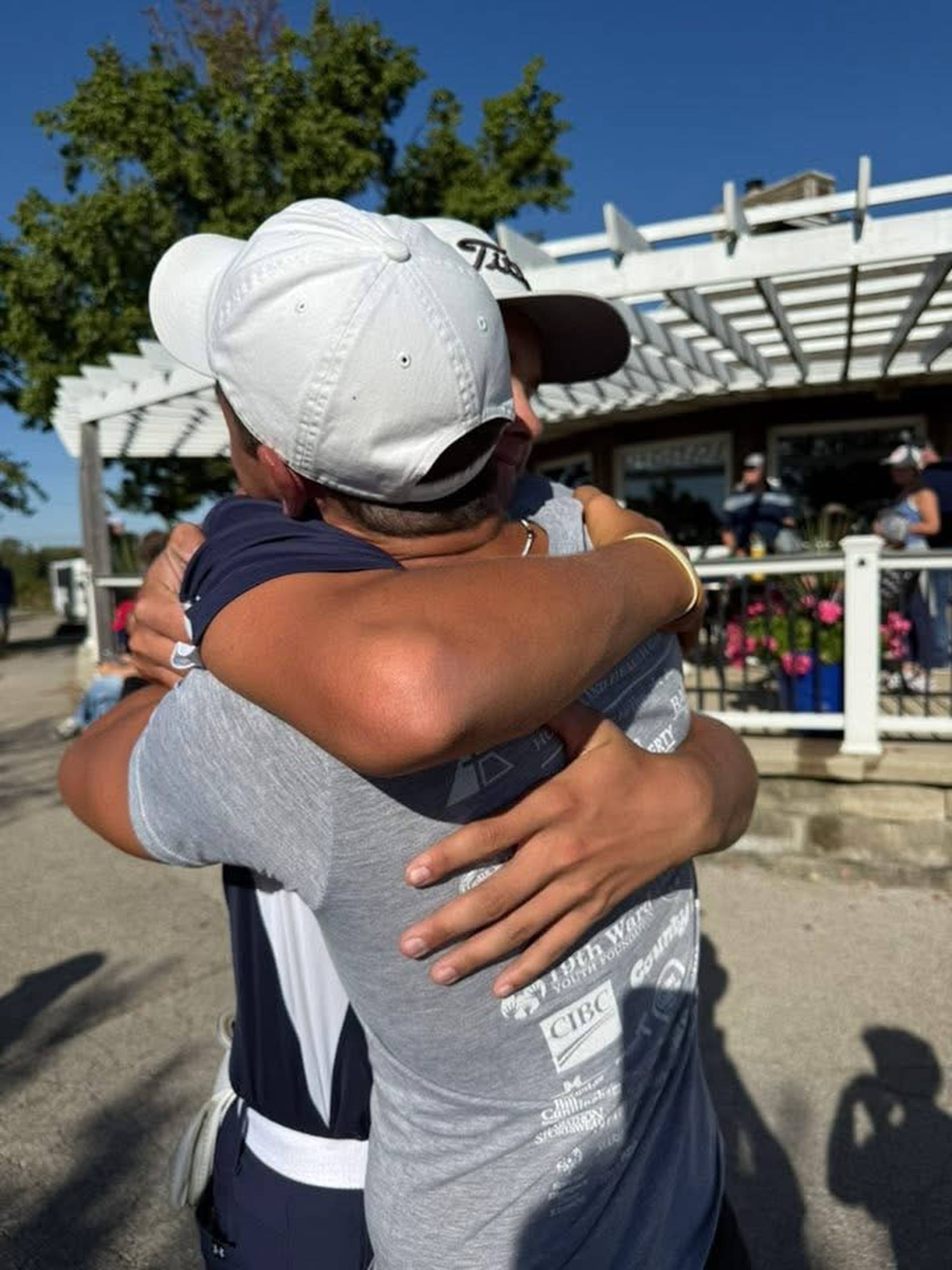 Wyatt Novotny gets a big hug from his brother, Colton, after winning the 2025 IHSA Class 1A State golf championship. He is the first state golf champion from Bureau County.