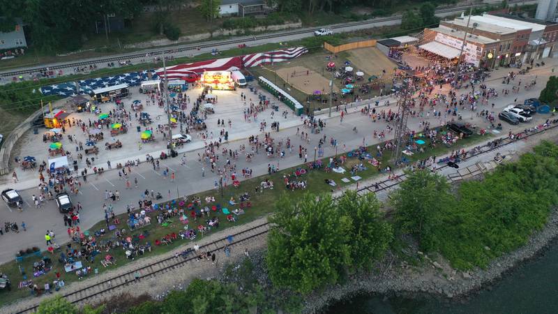 An aerial view of Water Street packed with people for the Independence Day fireworks on Thursday, July 3, 2025 in Peru. a