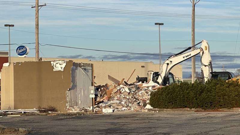 An excavator demolished the former Midland Bank building on Thursday, Jan. 16, 2025 at the southeast corner of Backbone Road and North Main Street in Princeton. The lot will be cleared and an Aldi will be erected sometime this year.