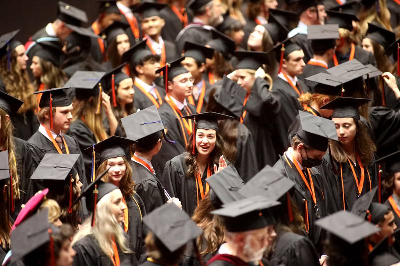 St. Charles East graduates enter the Northern Illinois University Convocation Center in DeKalb for the school’s  commencement ceremony at  on Monday, May 23, 2022.