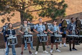 Oswego students march into a new school year