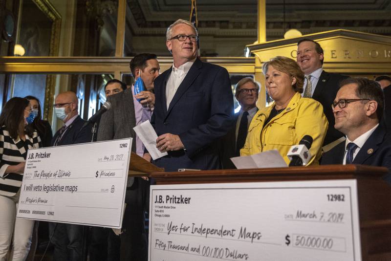 FILE - In this May 29, 2021, file photo, Illinois House Republican Leader Jim Durkin, R-Western Springs, joins Illinois House and Senate Republicans outside Illinois Gov. J.B. Pritzker's office to urge him to veto the redrawn Illinois legislative maps at the Illinois State Capitol in Springfield, Ill.