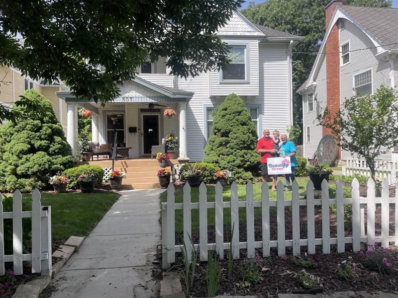 The home of Delmar (left) and Nicole Miller (right) was selected as one of the May honorees of the Beautify Dixon recognition program.