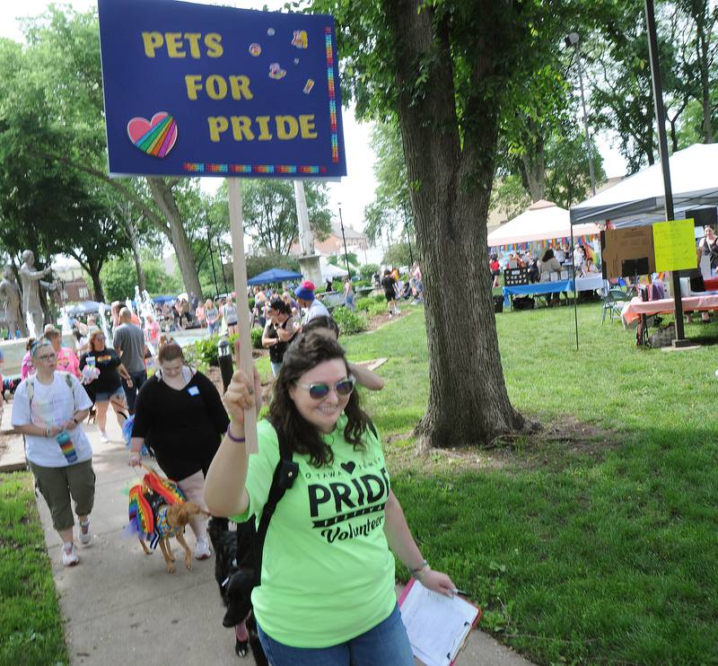 Owners and their pets began their march for the Pets For Pride Parade on Saturday, June 11, 2022, at Washington Square in Ottawa during the Ottawa Family Pride Fest.