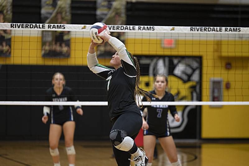 Rock Falls’ Denali Stonitsch sets the ball against Newman Thursday, Oct. 26, 2023 in the class 2A regional finals at Riverdale.