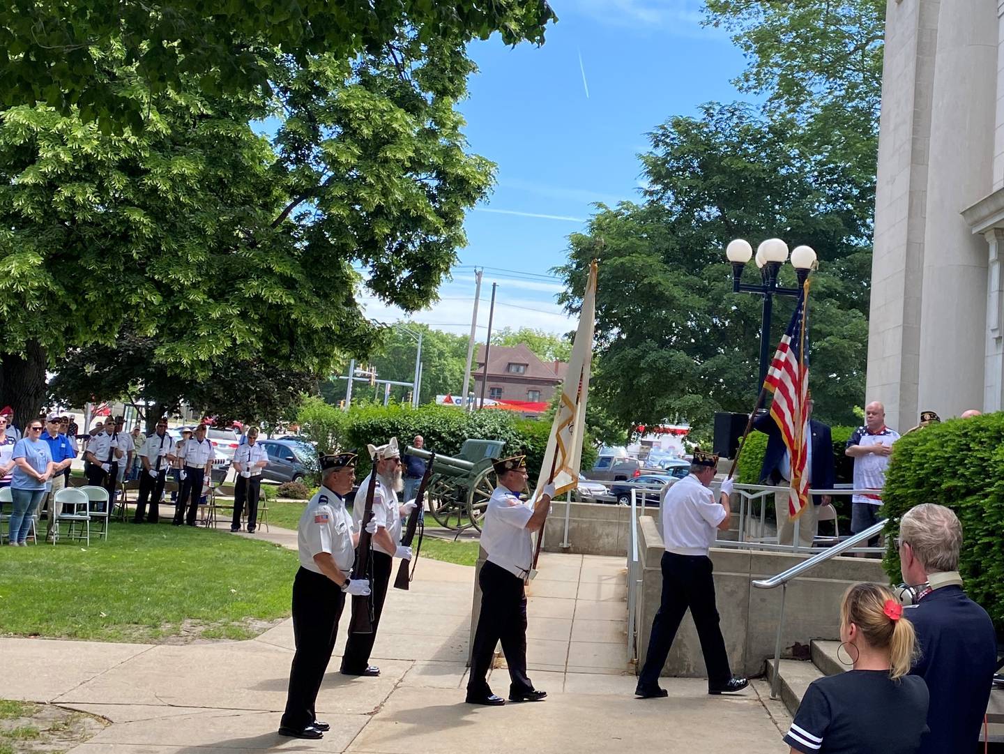 The Morris Color Guard displays the flag Monday morning at the Grundy County Courthouse in Morris.
