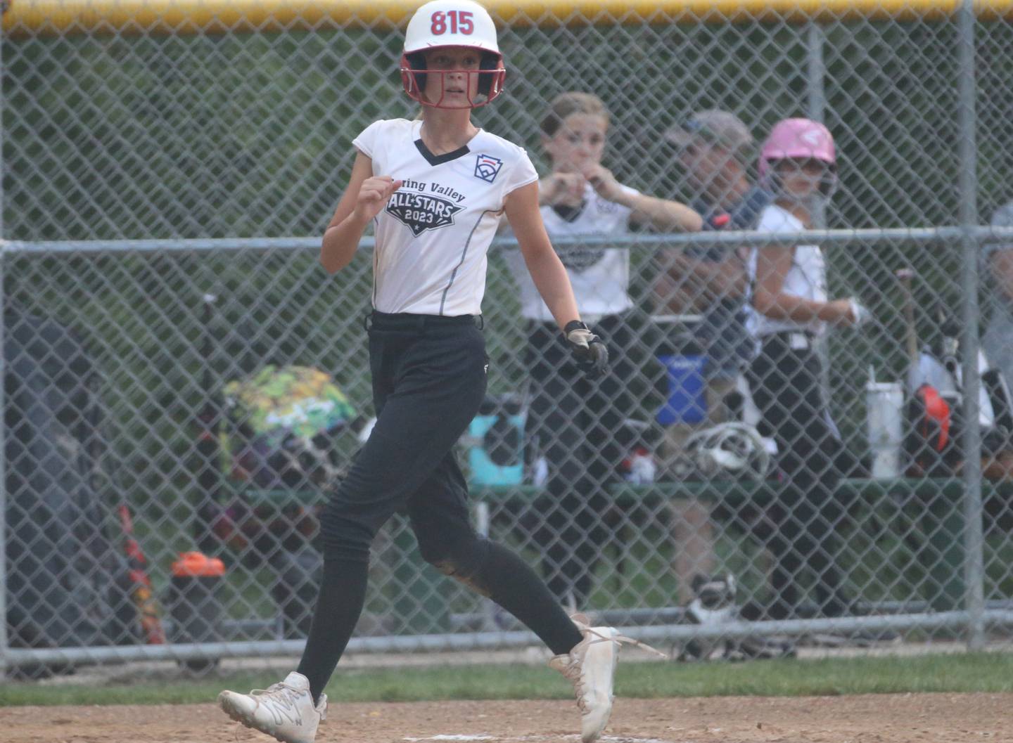 Vivi Verucchi scores the teams first run against Tri-Cites  on Tuesday, July 25, 2023 at McKinley Park in Peru.