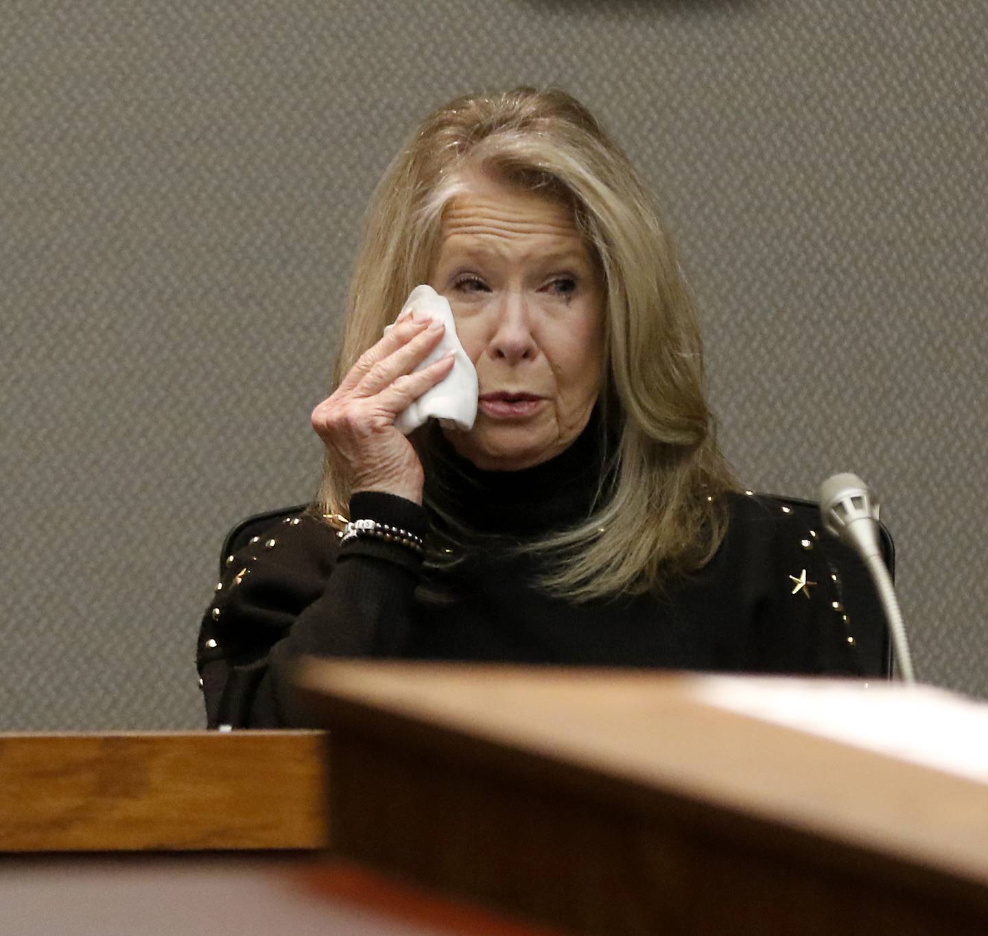 Suzanne Bishop wipes a way a tear as she talks about her son, William Bishop, during his sentencing hearing before McHenry County Judge Michael Coppedge on Thursday, Jan. 26, 2023, in the McHenry County courthouse in Woodstock.