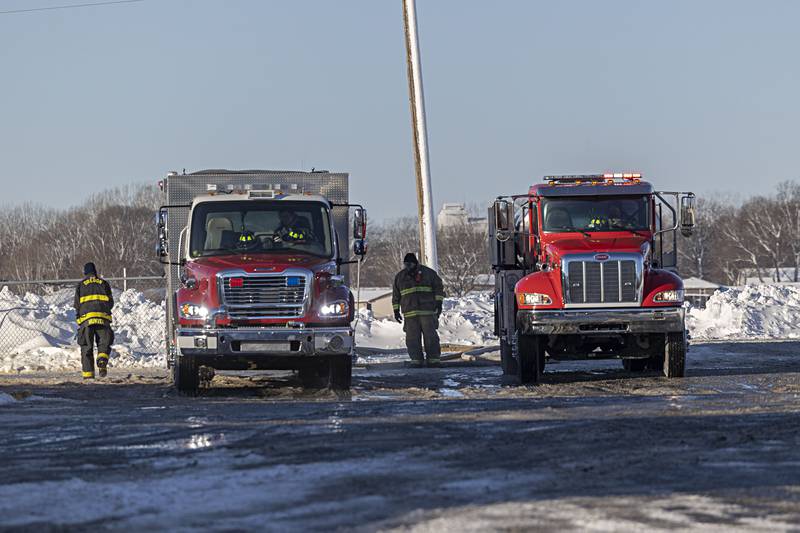 Local departments gather at East Coloma-Nelson school to fill up on water from the hydrants Tuesday, Jan. 16, 2024.