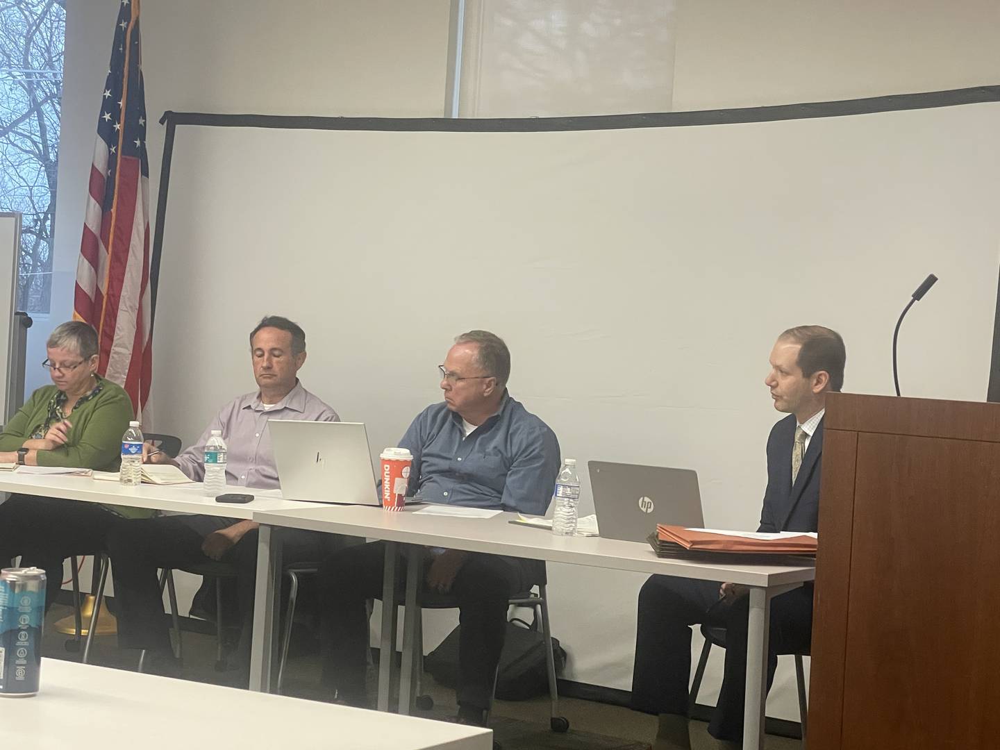 (From left): Members of the DeKalb Electoral Board, DeKalb city recording secretary Ruth Scott; 6th Ward Alderman Mike Verbic; 3rd Ward Alderman Tracy Smith and city attorney Matt Rose, convene on Tuesday, Nov. 19, 2024, at the DeKalb Police Department to review an opposition filed against mayoral candidate Linh Nguyen's 2025 consolidated election papers. The Board ruled in favor of the opposition, ousting Nguyen from the ballot.