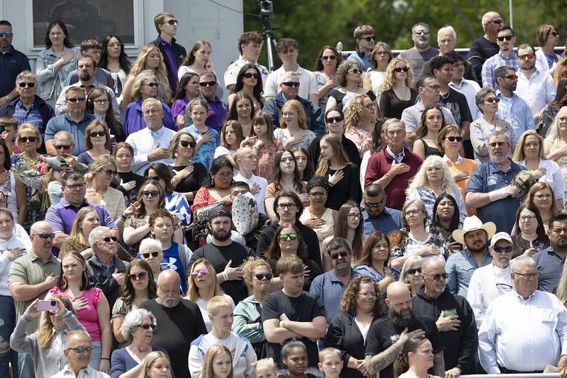 Hundreds pack the stands of A.C. Bowers field Sunday, May 25, 2025, during Dixon High School’s graduation.