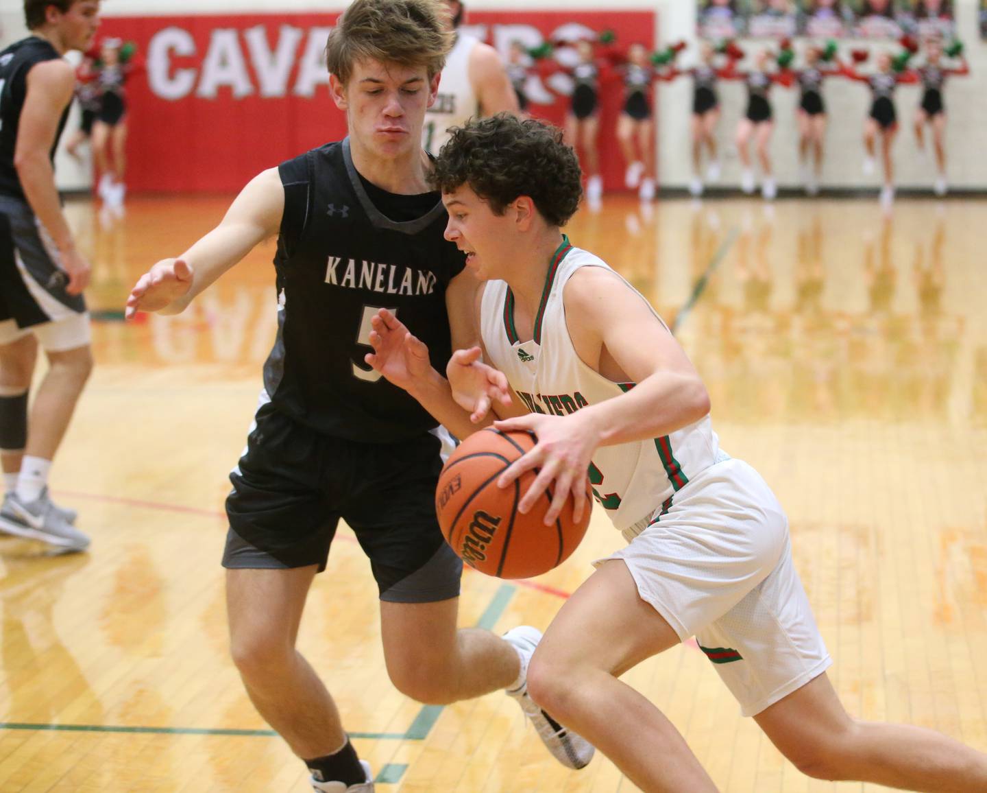 L-P's Michael Hartman drives to the lane as Kaneland's Brad Franck defends on Tuesday, Dec. 12, 2023 in Sellett Gymnasium.