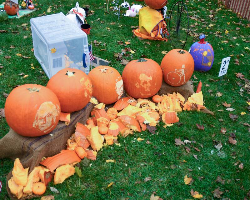 The Kevin White family received 2rd place in the family category with presidential faces placed on pumpkins during the Sycamore Pumpkin Festival that was on display at the Sycamore Courthouse lawn on Friday Oct. 27, 2023.