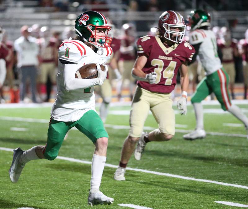 L-P's Caleb Burrell (1) sprints down the field during a punt return against Morris during the Class 5A round one football game on Friday, Oct. 28, 2022 in Morris.