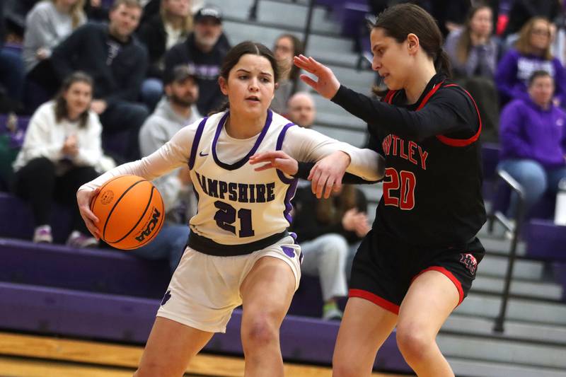 Huntley’s Alyssa Borzych, right, guards Hampshire’s Veronica Dumoulin in varsity girls basketball on Wednesday, Feb. 11, 2026, at Hampshire High School in Hampshire.