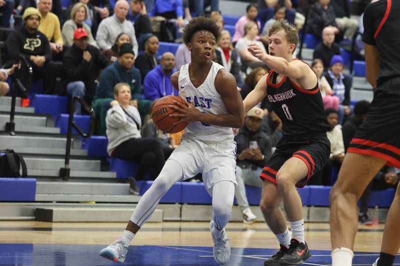 Lincoln-Way East’s BJ Powell looks to make a play against Bolingbrook on Tuesday, Dec.12th, 2023 in Frankfort.