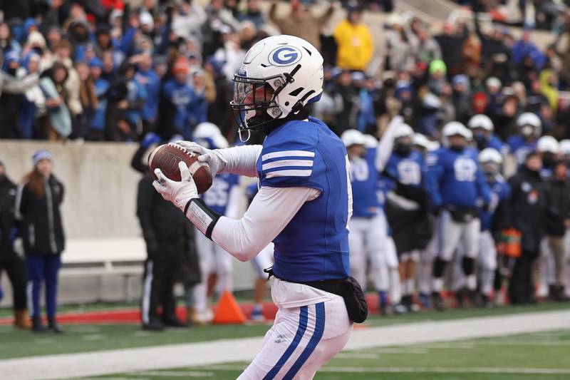 Geneva’s Finnegan Weppner pulls in a pass for the touchdown against East St. Louis in the Class 6A state championship on Saturday, Nov. 30, 2024 in Normal.