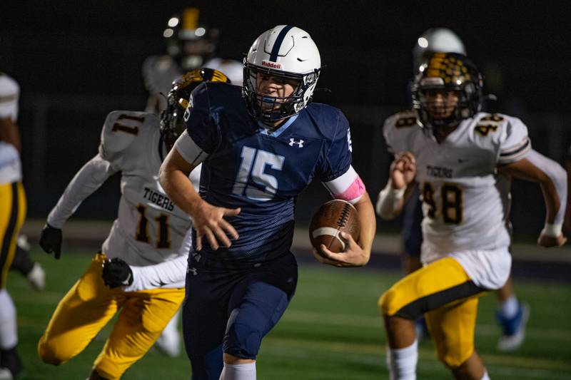 Plainfield South's Cody Hogan is pursued by Joliet West during a game,  Friday Oct. 4, 2024 at Plainfield South High School