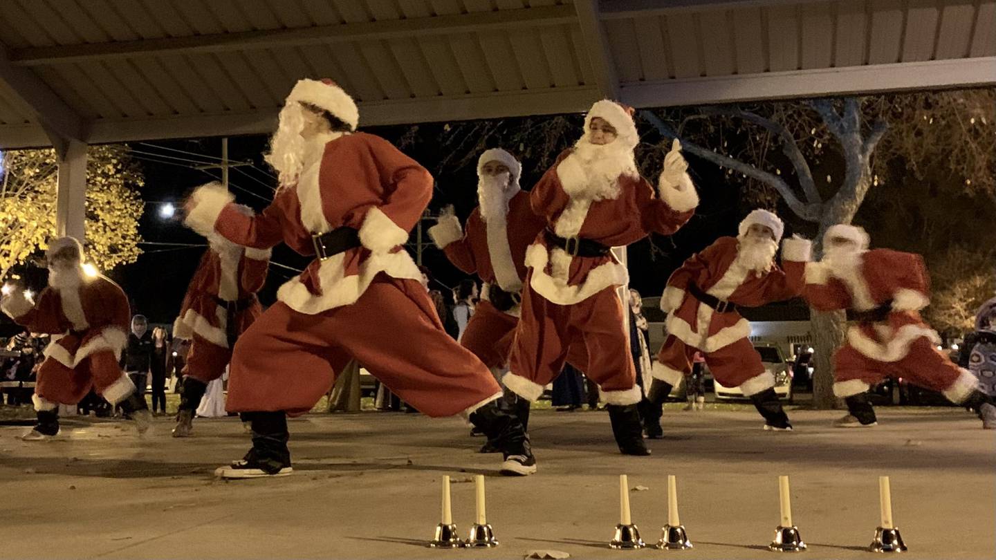 The Santa Dancers performing for a crowd of over 100 people at the start of the Yorkville Holiday Celebration Weekend in Riverfront Park on Nov. 17, 2023.