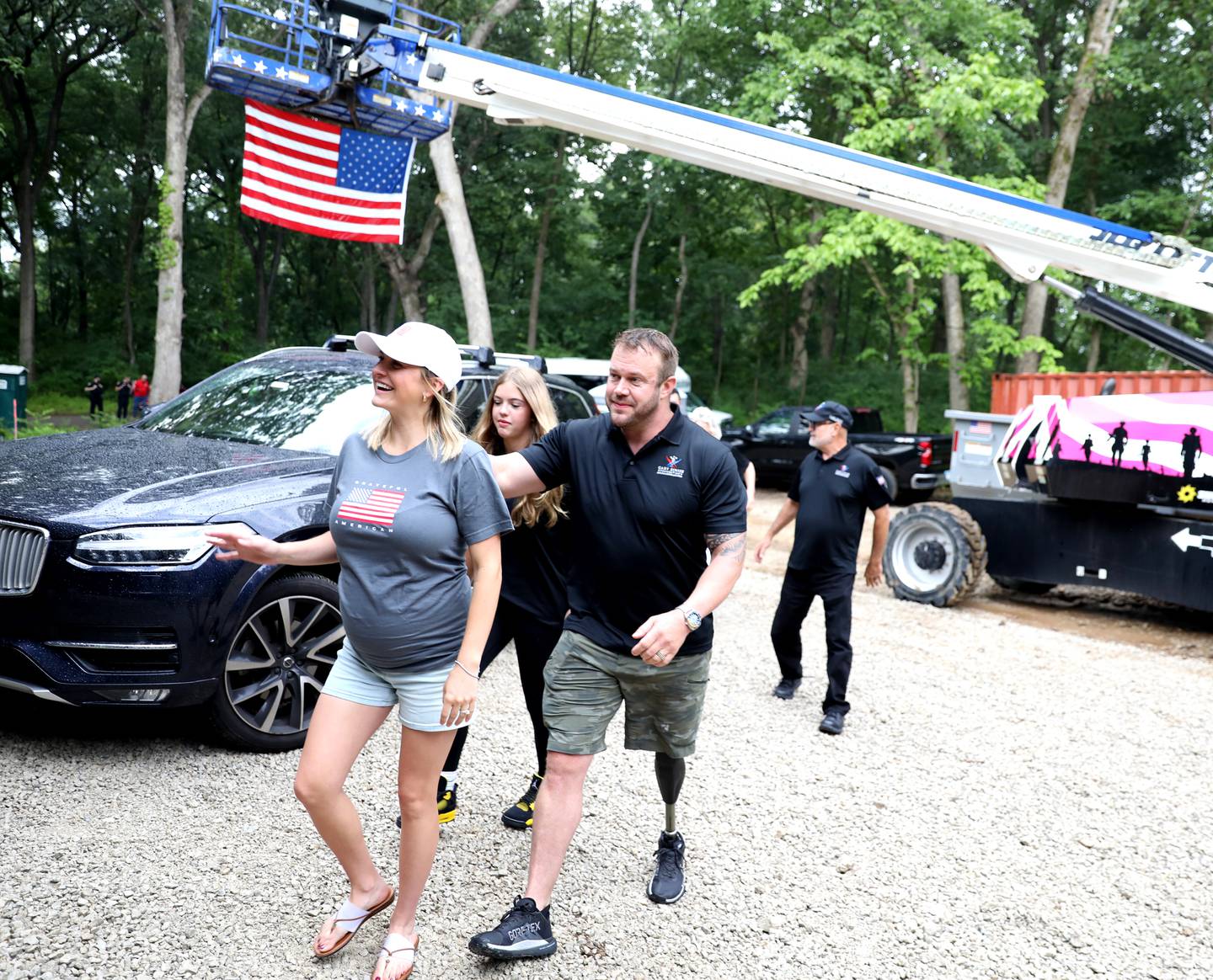 Retired U.S. Army Chief Warrant Officer 2 Patrick Scrogin, who was critically wounded in a helicopter crash while deployed in Iraq in March 2007, his wife, Alexa, and daughter, Kaylee, 13, enter their under-construction home in St. Charles on Friday, July 14, 2023. The Gary Sinise Foundation’s R.I.S.E. (Restoring Independence, Supporting Empowerment) Program is building the home along with in-kind donations from various national partners, sub-contractors, and the American public.