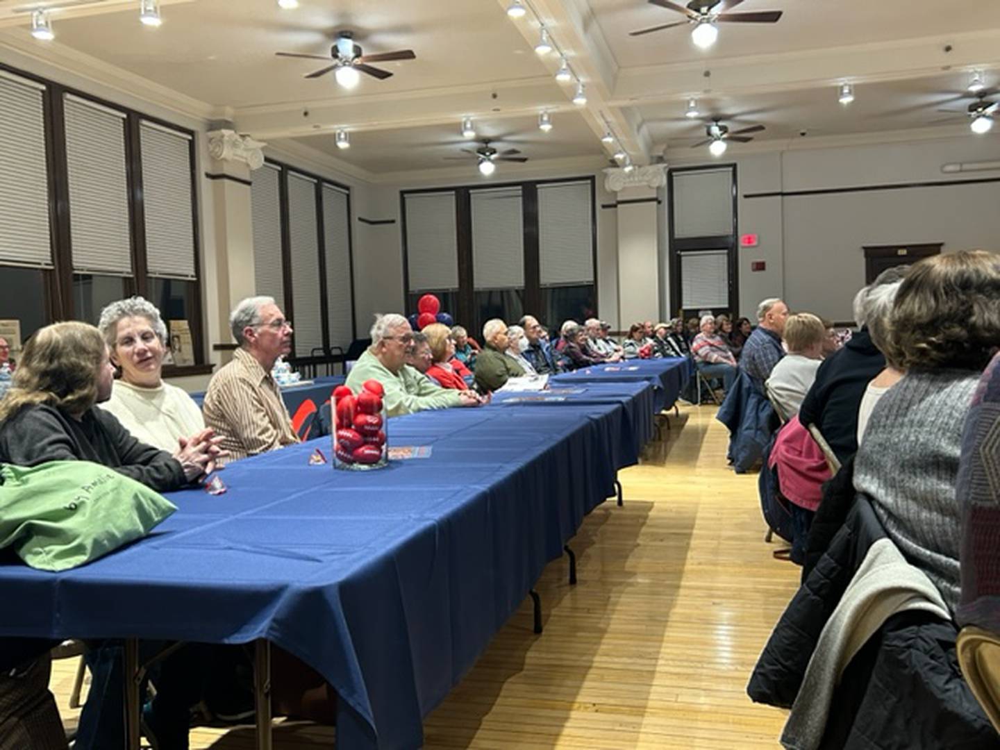 Guests chat at the Northwest Territory Historic Center in Dixon on Tuesday night during a celebration of President Ronald Reagan's birthday and to remember his visit to Dixon 40 years ago.