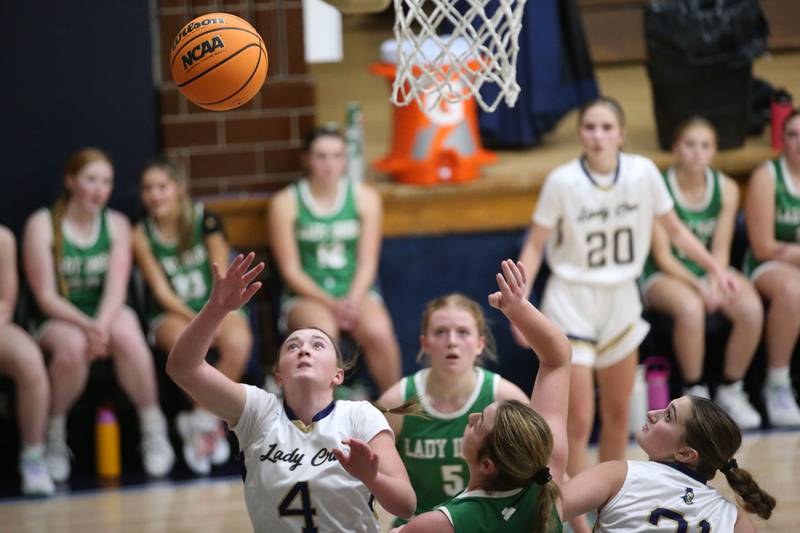 Marquette's Hunter Hopkins shot comes up short as she lets go of the ball in the lane against Seneca on Thursday, Dec. 5, 2024 in Bader Gym at Marquette High School.