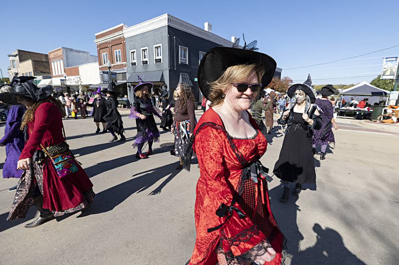 Dressed as witches, line dancers with the Dixon Country Line Dancers group perform Saturday, Oct. 21, 2023 in downtown Dixon during Scarecrow Fest.