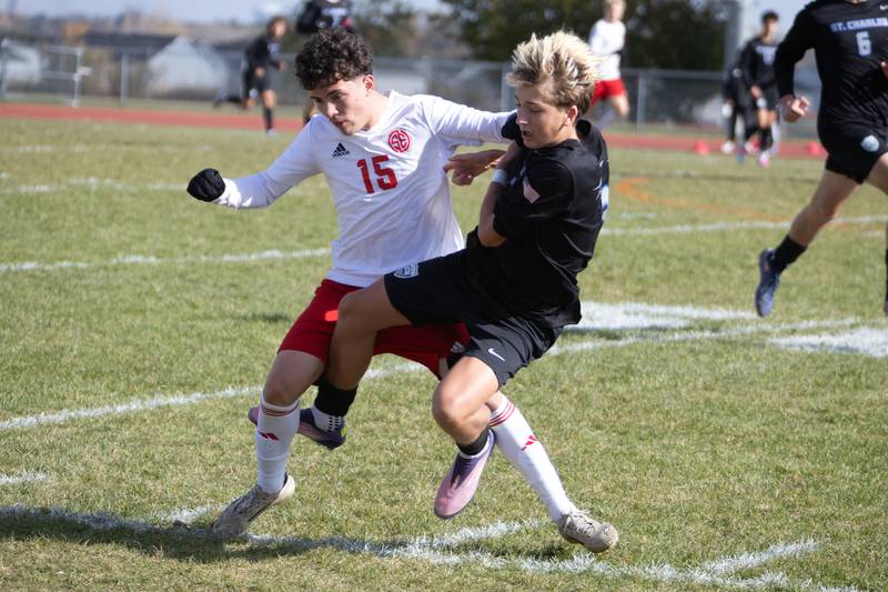 South Elgin's Santiago Lomperski battles for position with St. Charles North's Henry Dodd at the Class 3A Sectional Final on Saturday, Nov. 1,2025 in South Elgin.