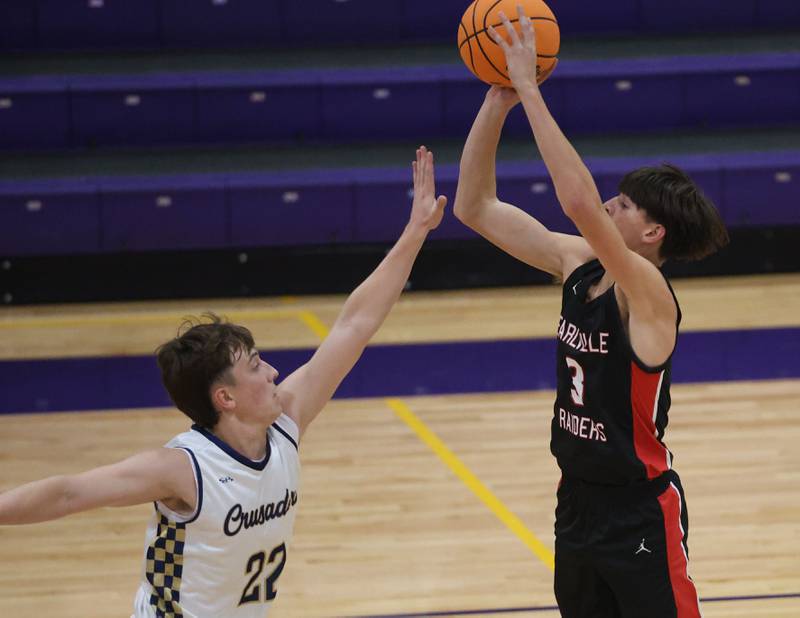 Earlville's Colton Fruit shoots a jump shot over Marquette's Griffin Dobberstein during the Huskers Hardwood Tip-Off Tournament on Tuesday, Nov. 25, 2025 in Serena.