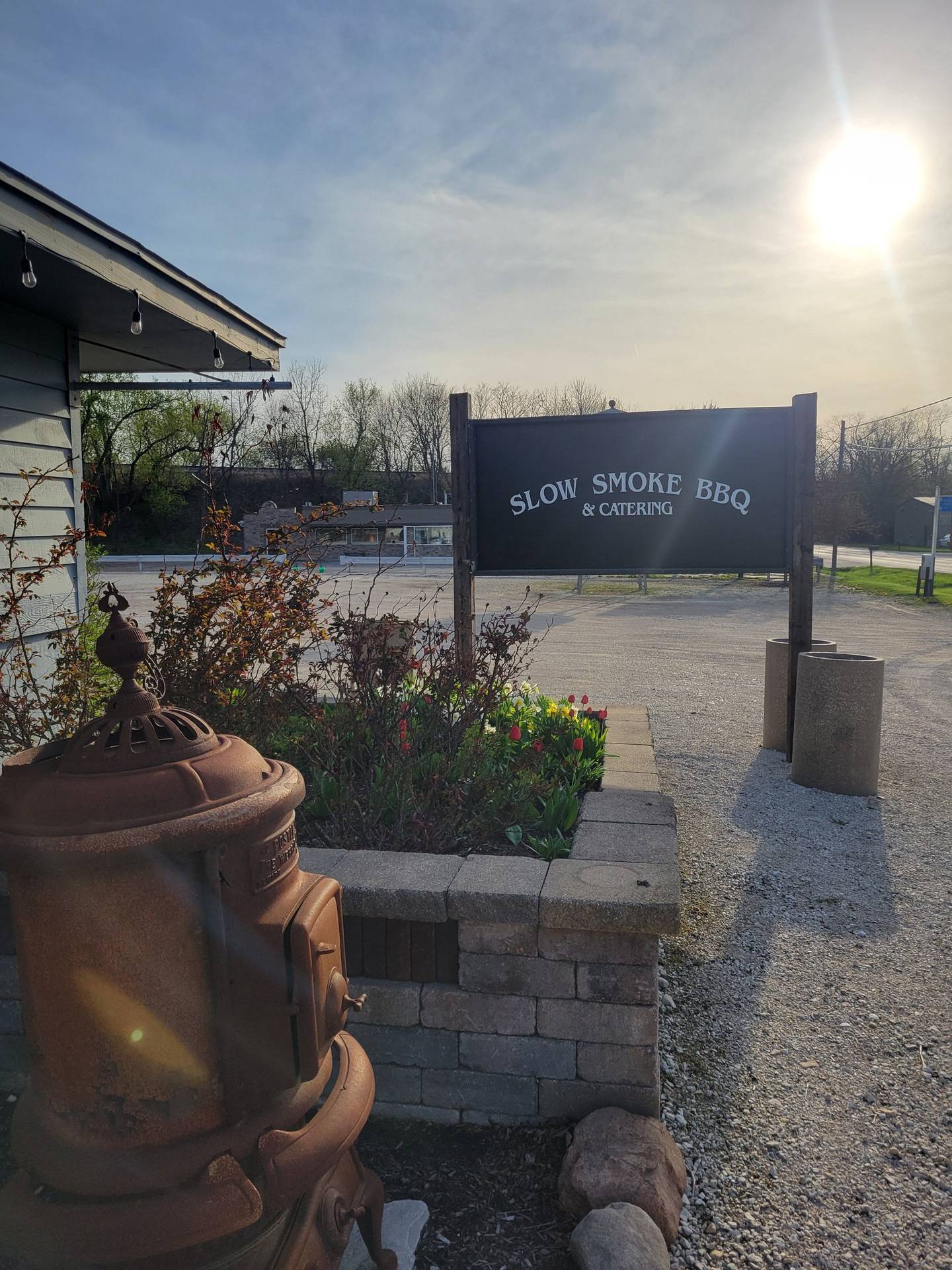 Slow Smoke BBQ is now located at Warehouse on Park in Genoa.