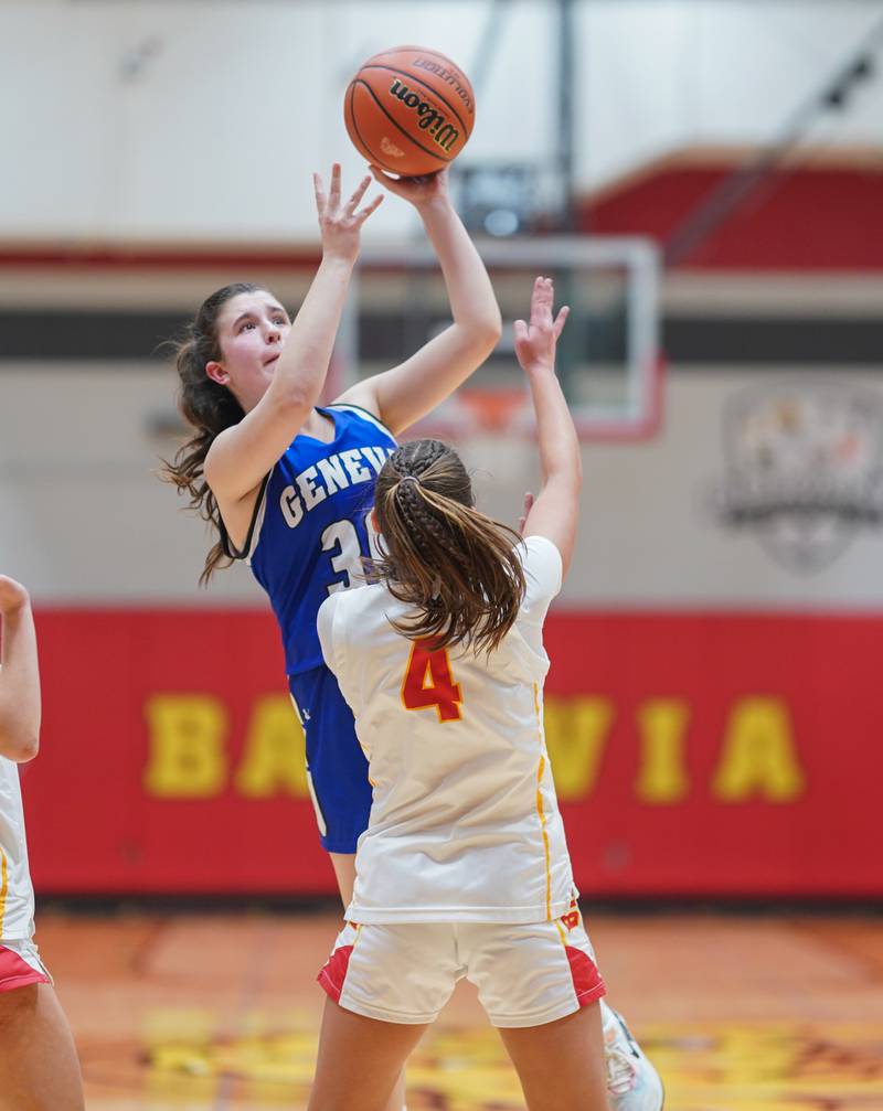 Geneva’s Keira McCann (30) shoots the ball in the post over Batavia's Addi Lowe (4) during a basketball game at Batavia High School on Friday, Jan 26, 2024.